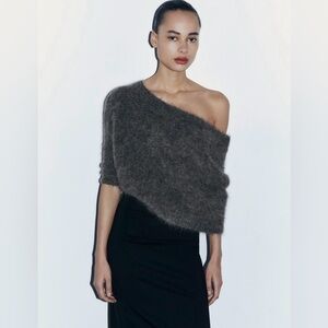 Asymmetric knit bolero